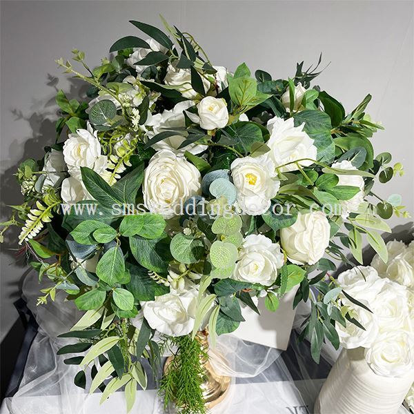 white and green floral centerpieces